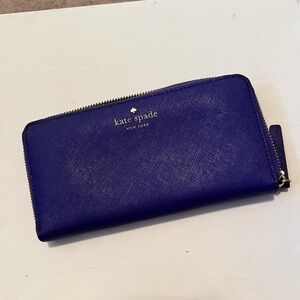 Purple Kate Spade zipper wallet